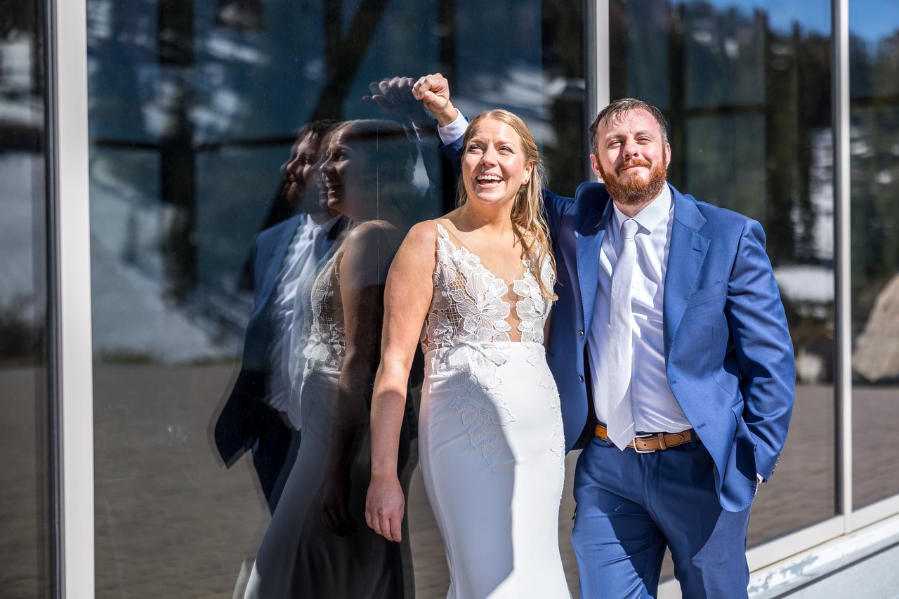 A fun fist pump in the glass reflection