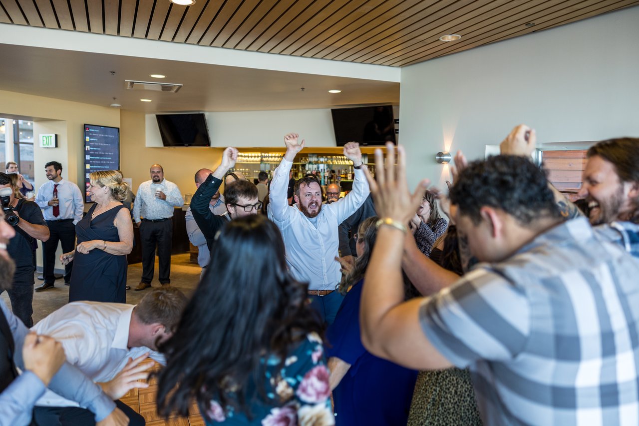 Guests with their arms up