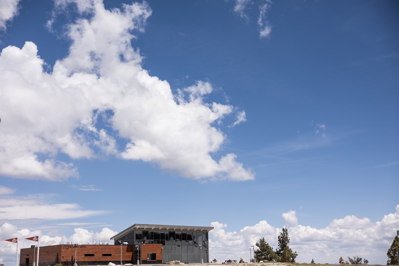 The lodge under big clouds
