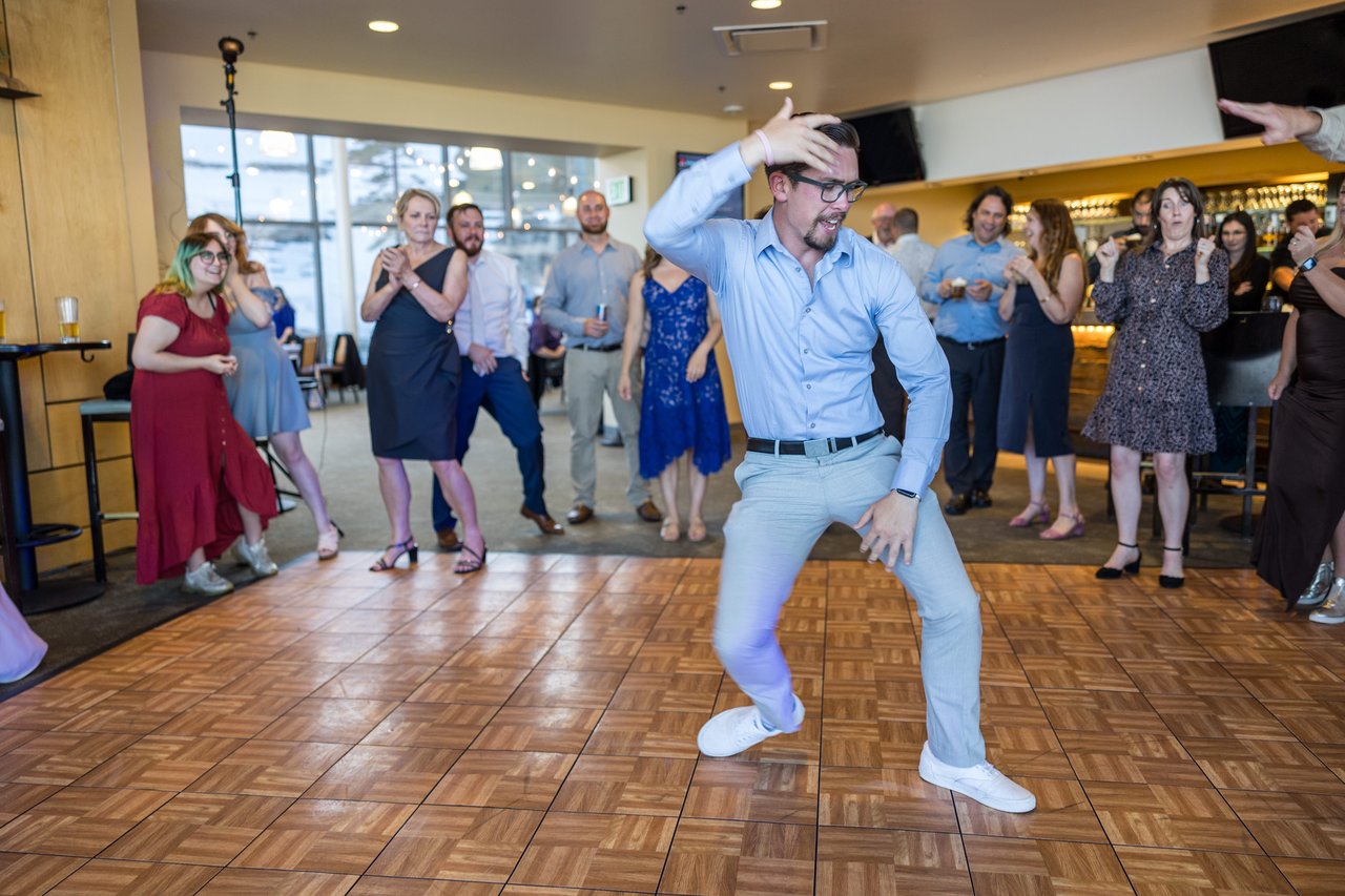 Robert dances in the middle of the circle