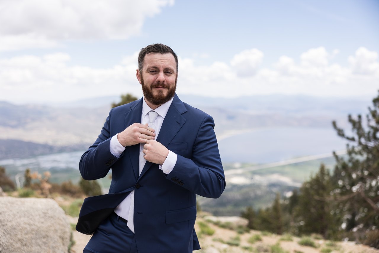 Robert straightens his tie