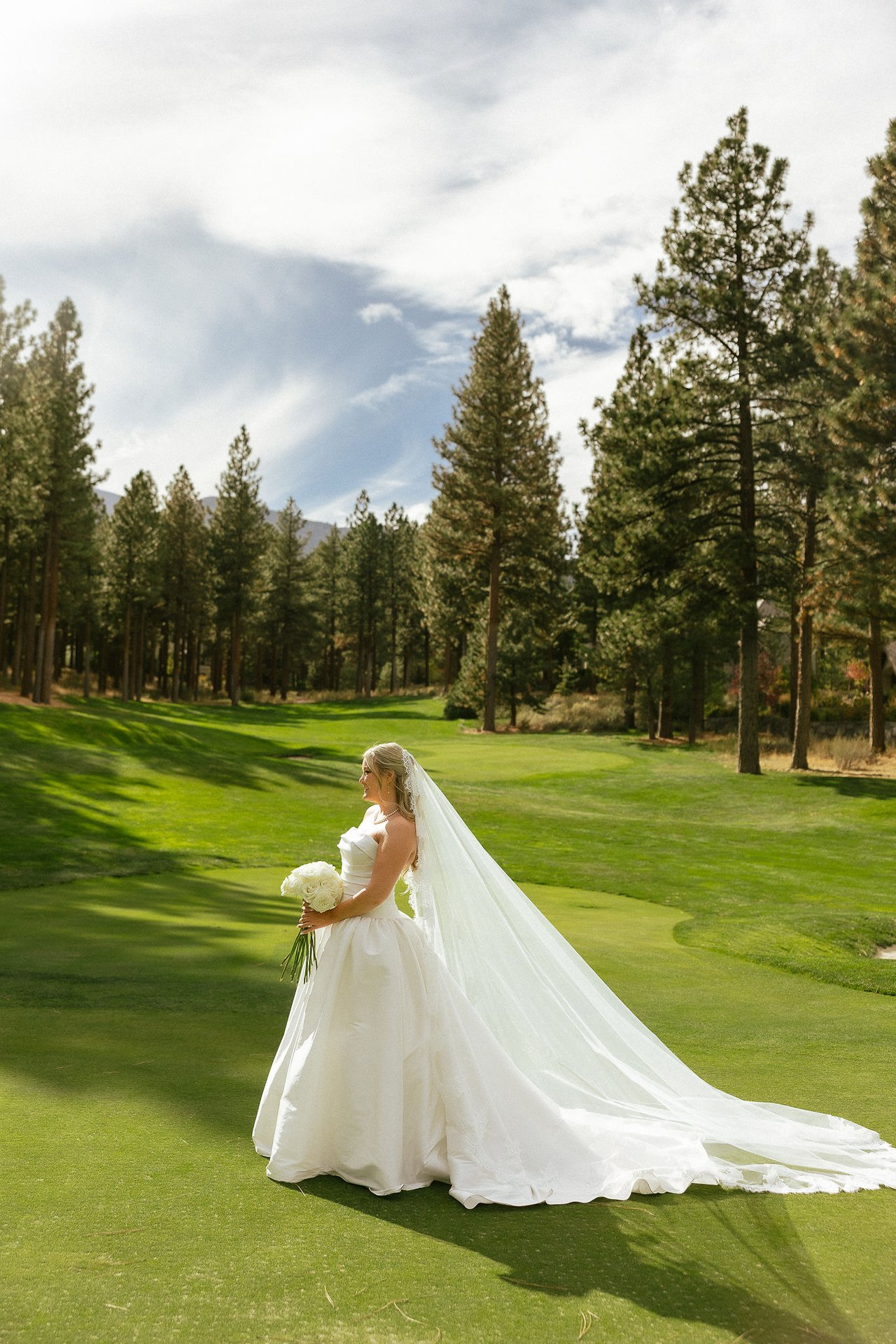 Ally in her long veil among the pines