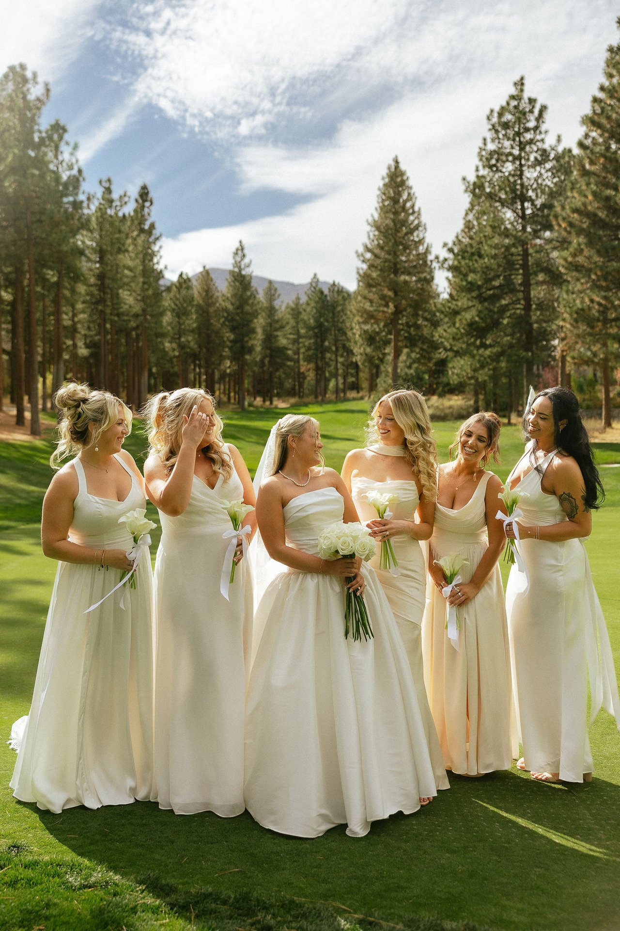 Ally laughs with her bridesmaids
