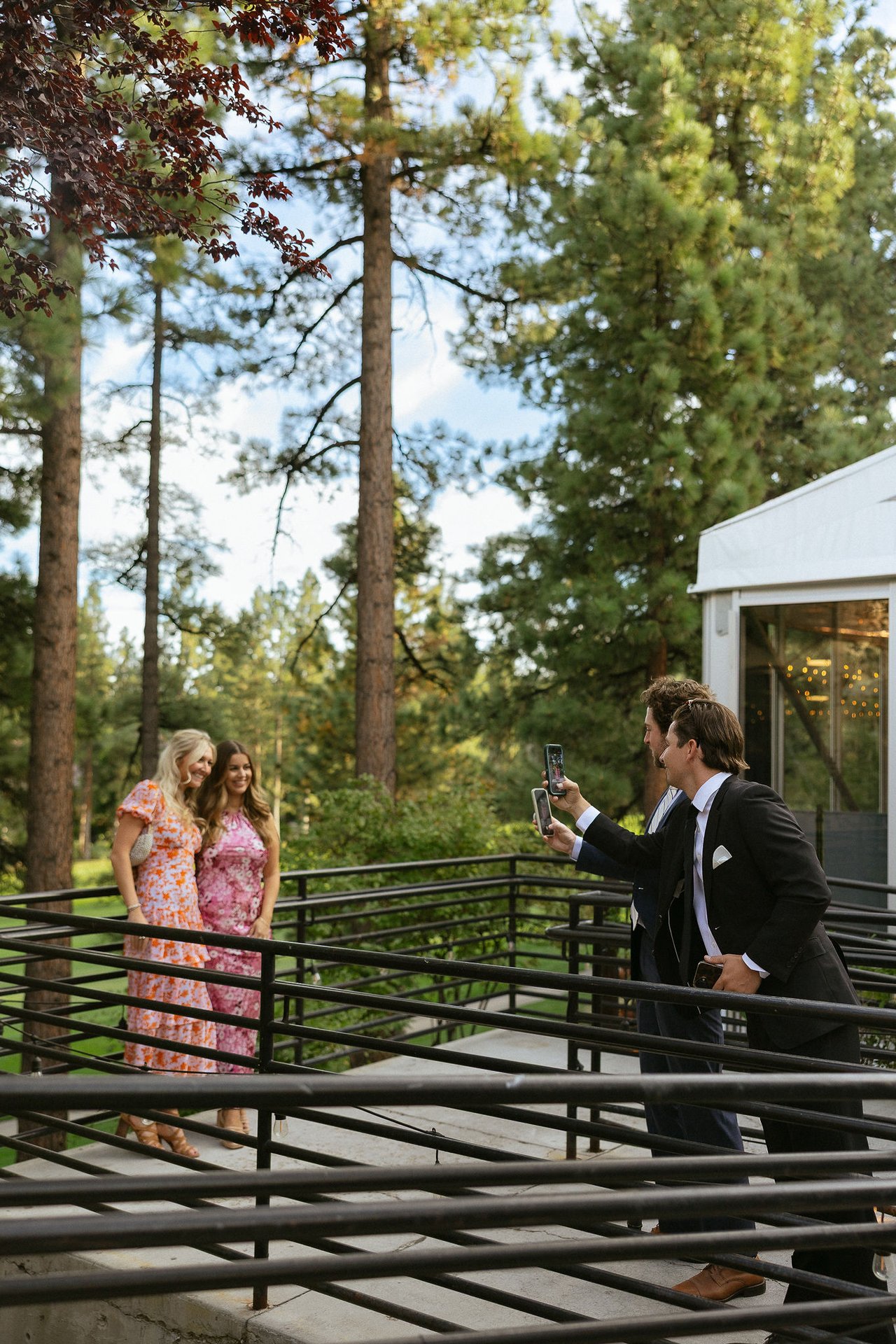 Guests gather on the deck stairs