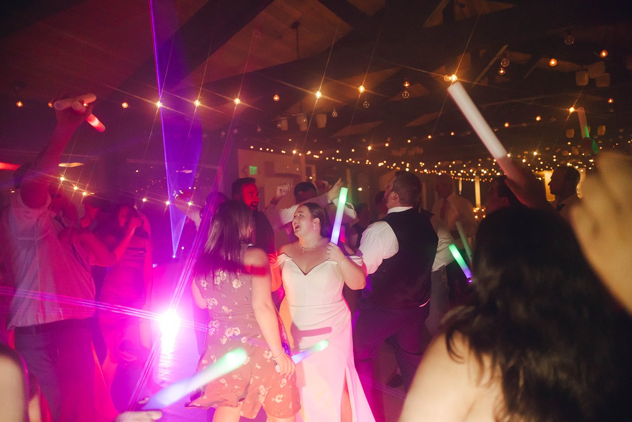 Autumn dances in the crowd under magenta lasers