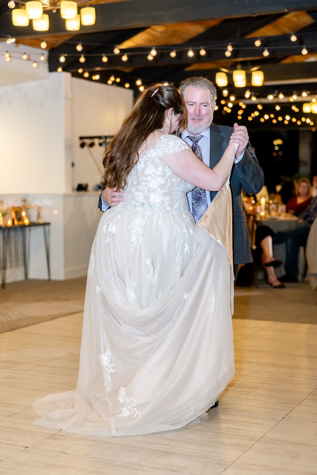 Danielle dances with her dad