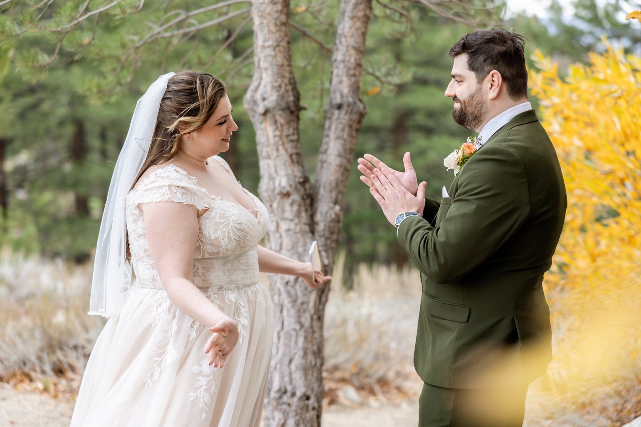 Danielle and Brandon laugh together after reading their letters