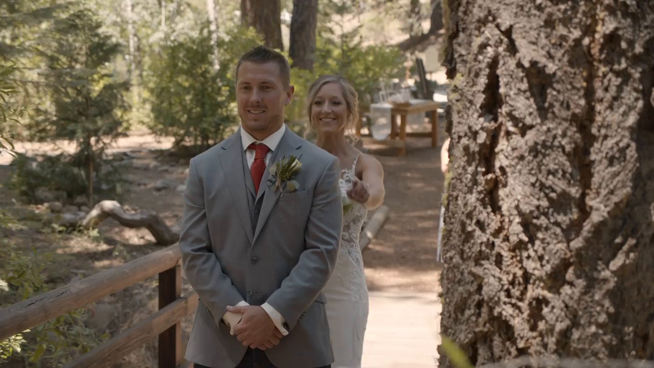 Scott waits on the wooden bridge as Danielle comes up behind him for the first look.