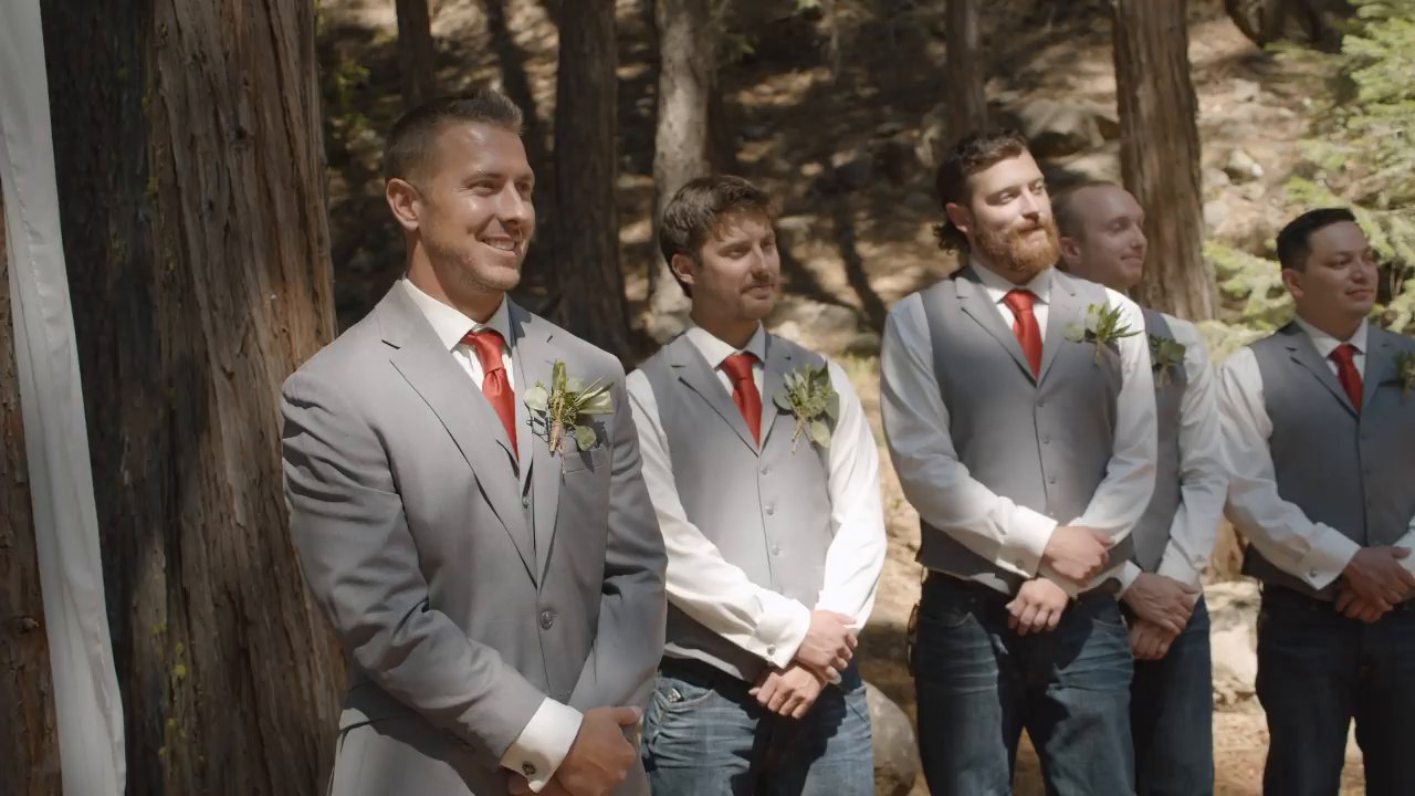 Scott and his groomsmen stand at the altar waiting for Danielle.