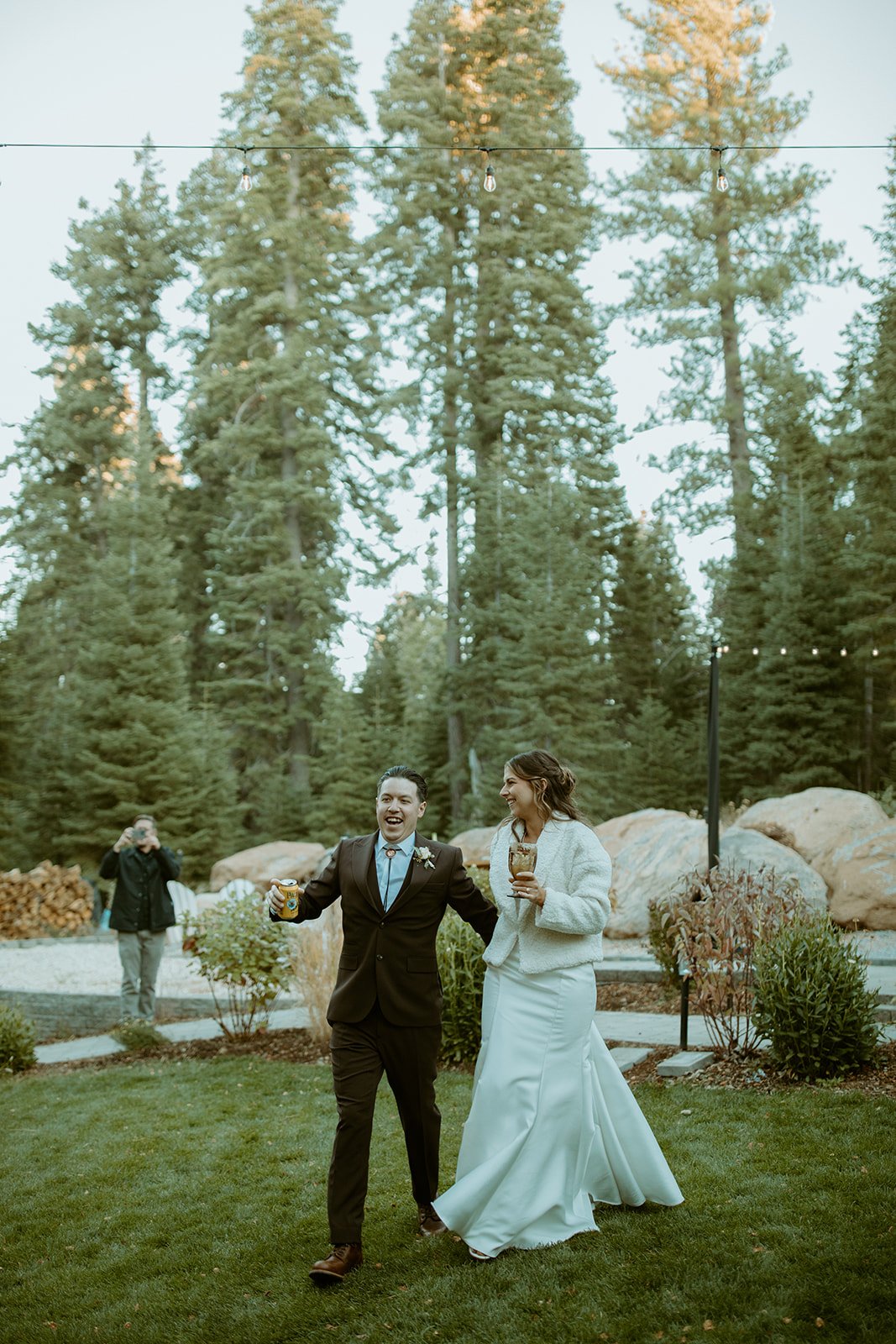 Emily and Devin dance onto the lawn for their grand entrance