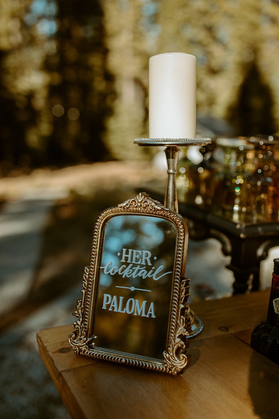 A mirror sign for her cocktail, a paloma