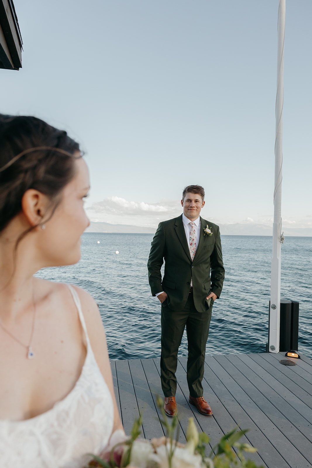 Emma sees Jackson for the first time, waiting for her at the end of the pier