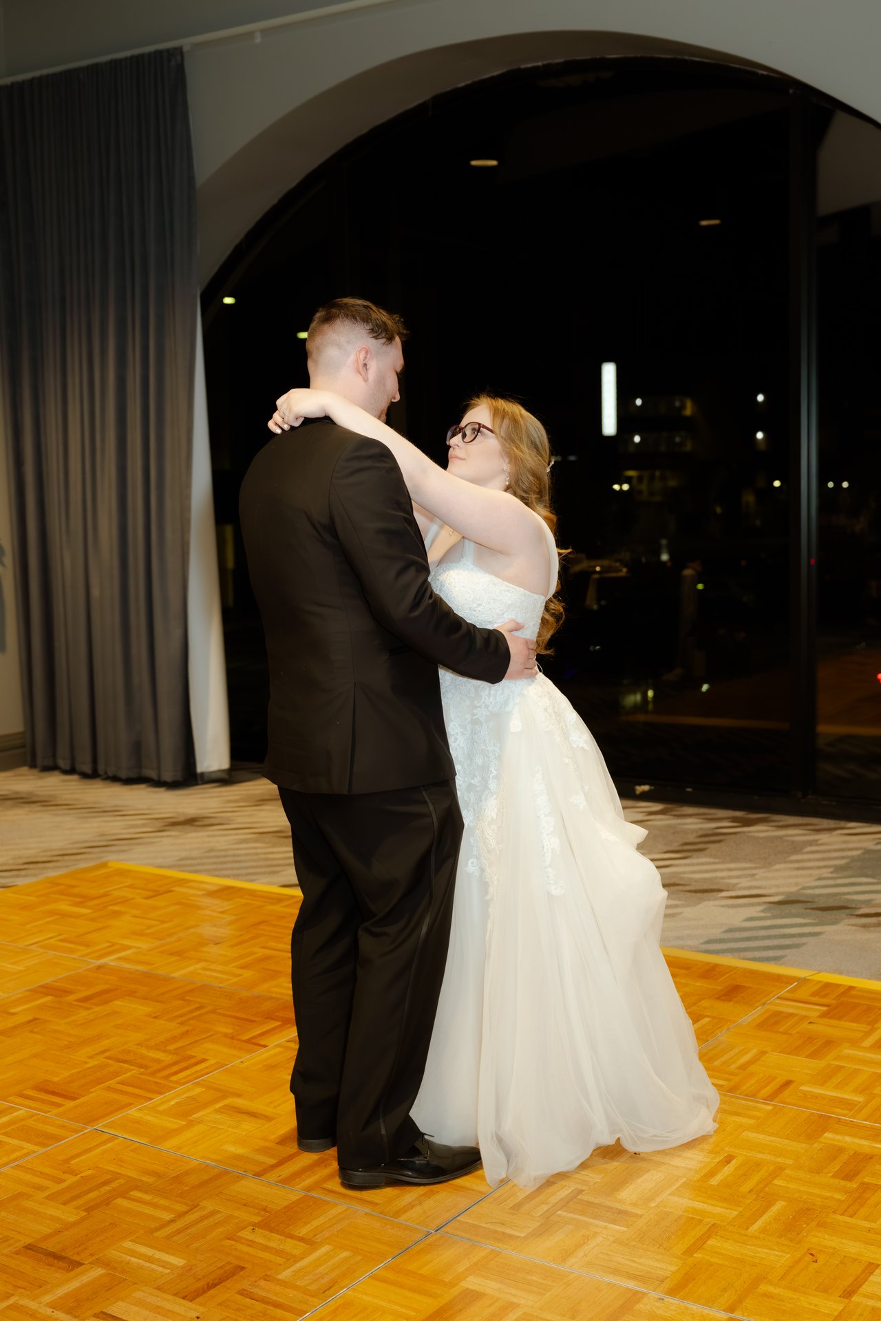 Hailey and Zen hold each other in their first dance
