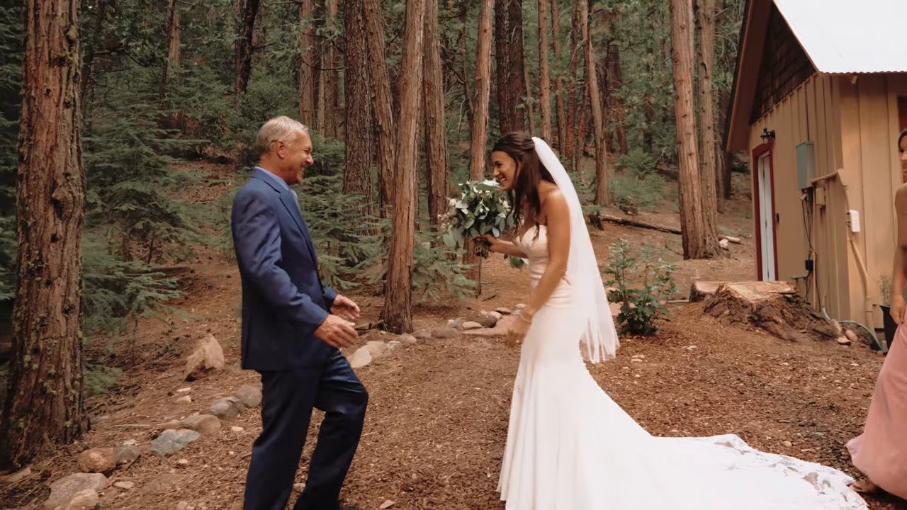 Jen's dad sees her in her gown for the first time among the pines