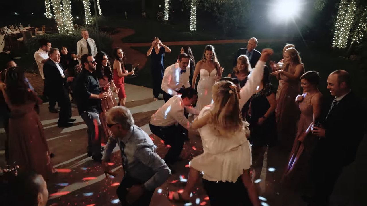Guests dance and drop low on the packed dance floor