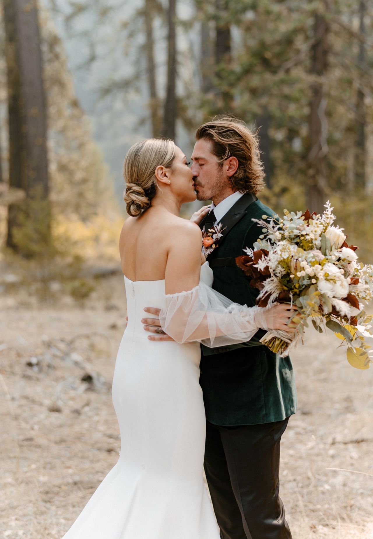 Joan and Kyle kiss in the forest clearing