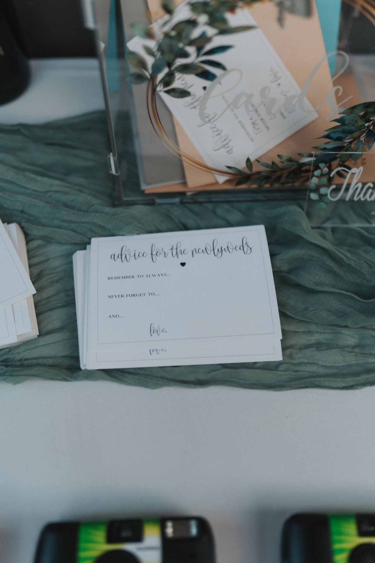 Advice cards for the newlyweds on the gift table