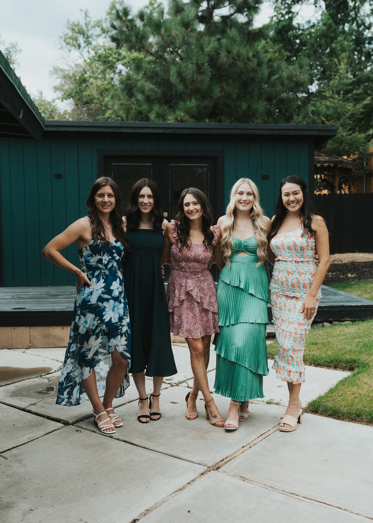 Lexy's bridesmaids in their mismatched dresses