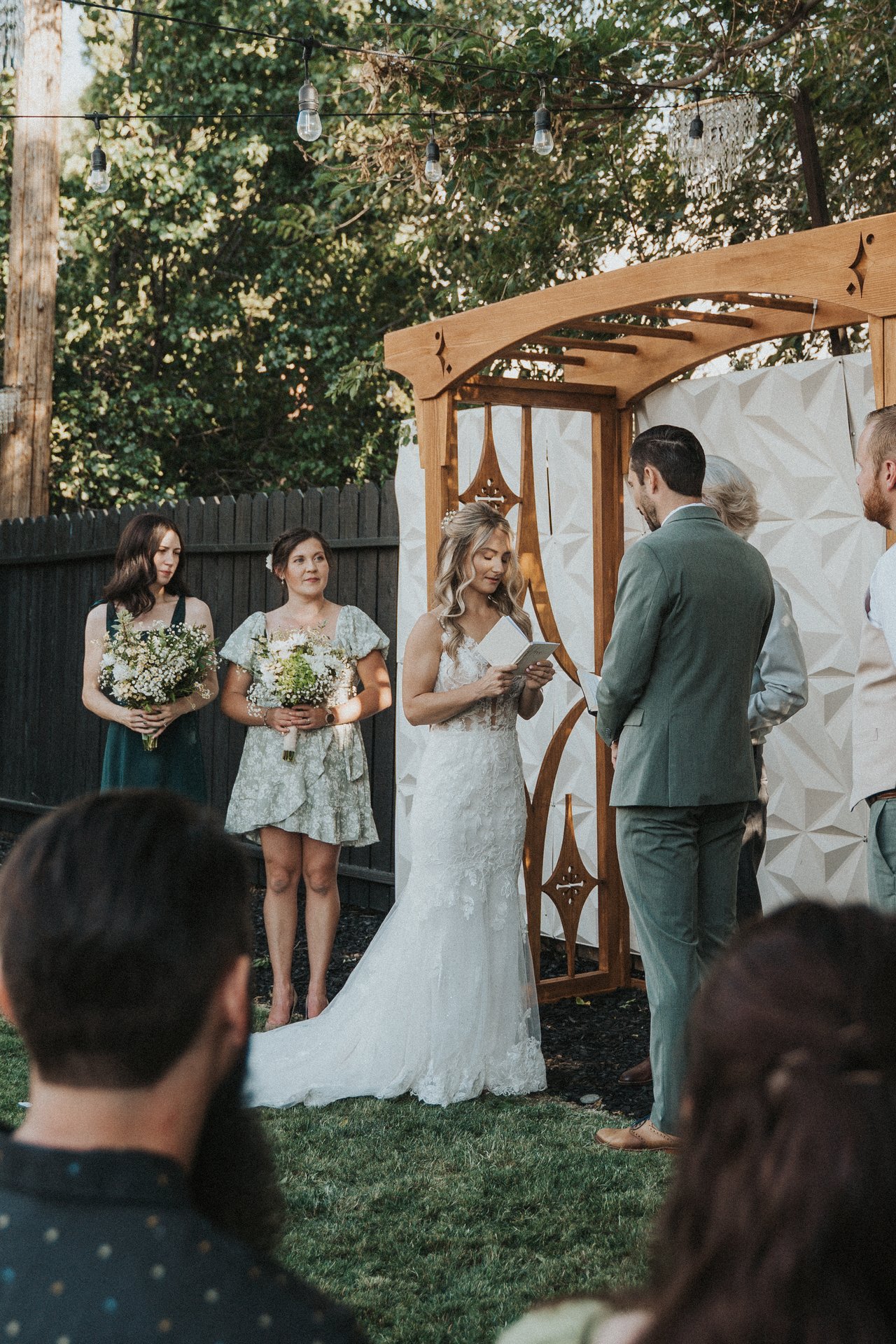 Guests watching Lexy and Jeremy say their vows
