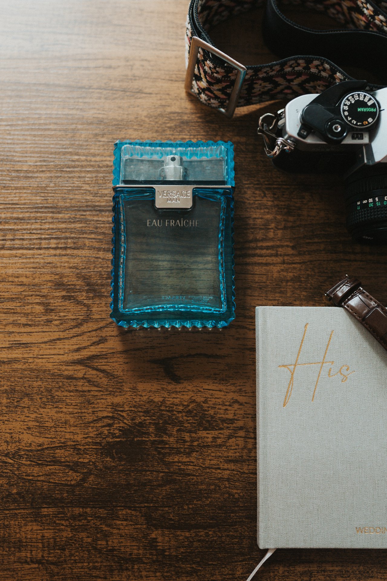 Jeremy's cologne and vow book on the table