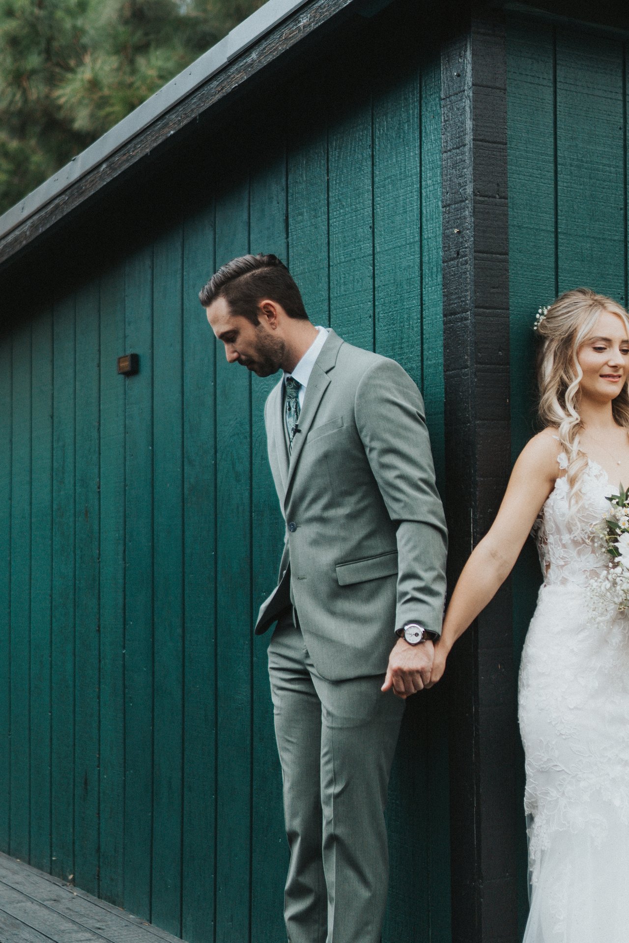 Jeremy smiles as he holds Lexy's hand without looking