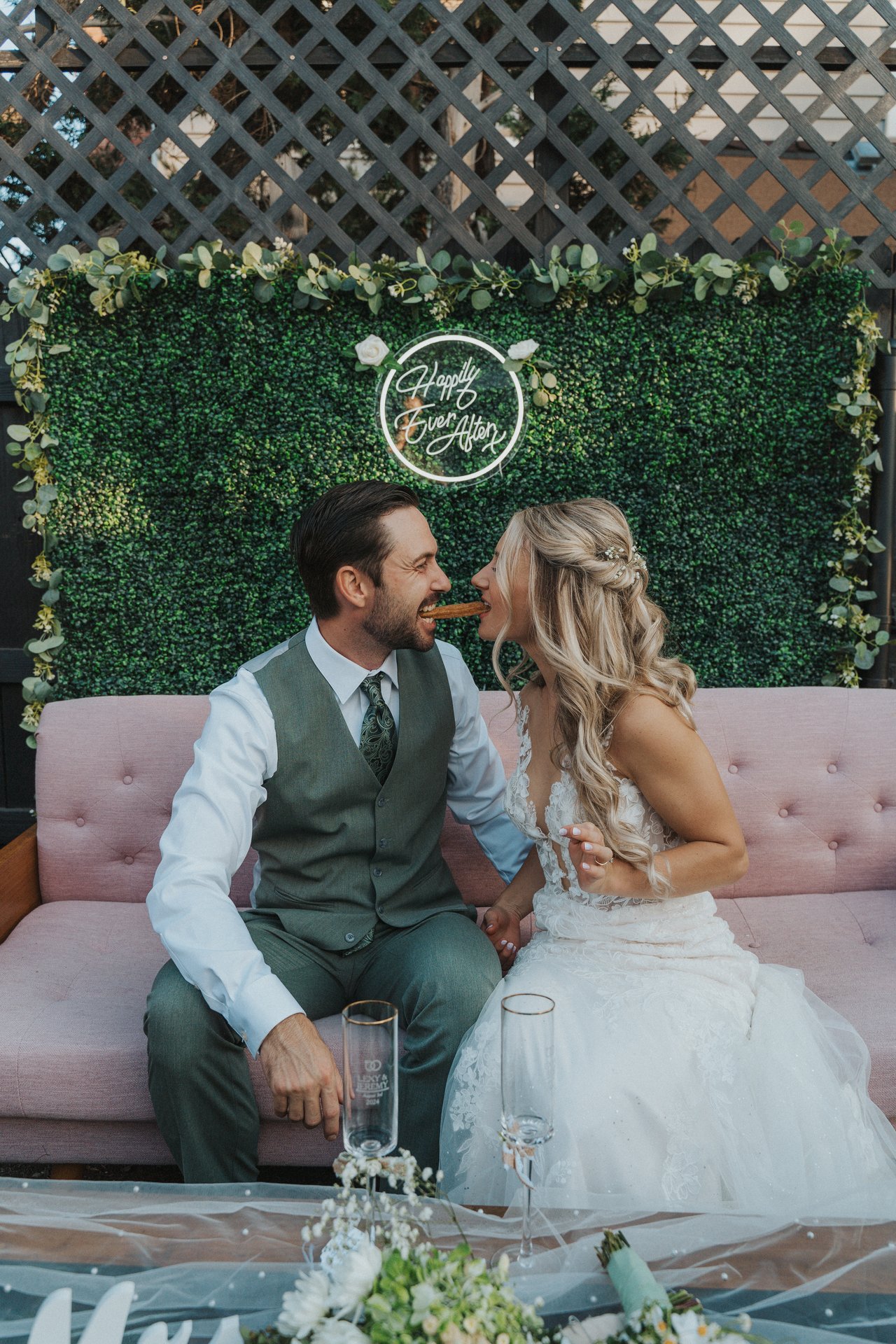 Lexy and Jeremy share a kiss on the couch