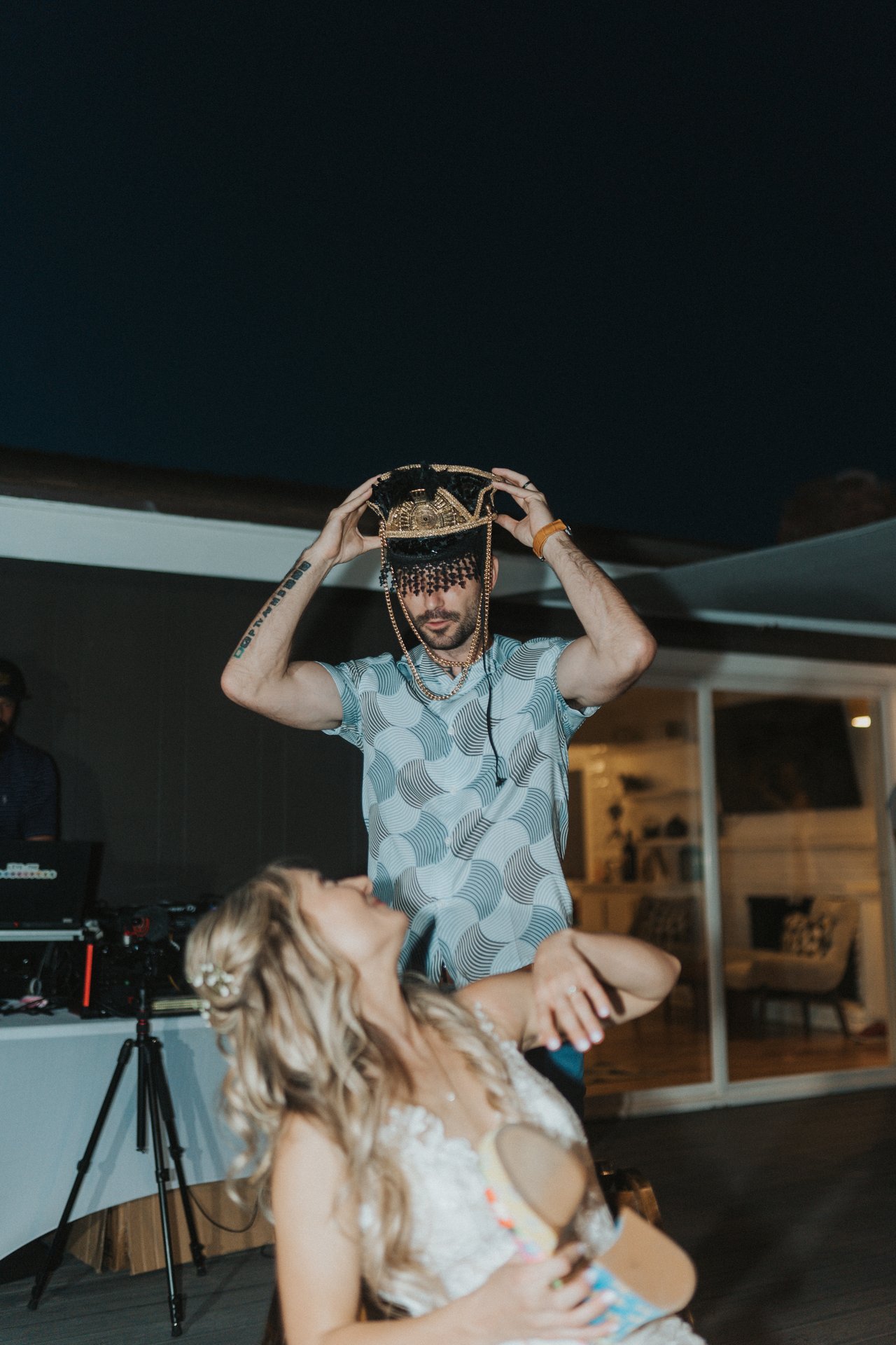 Jeremy wearing a crown at the reception