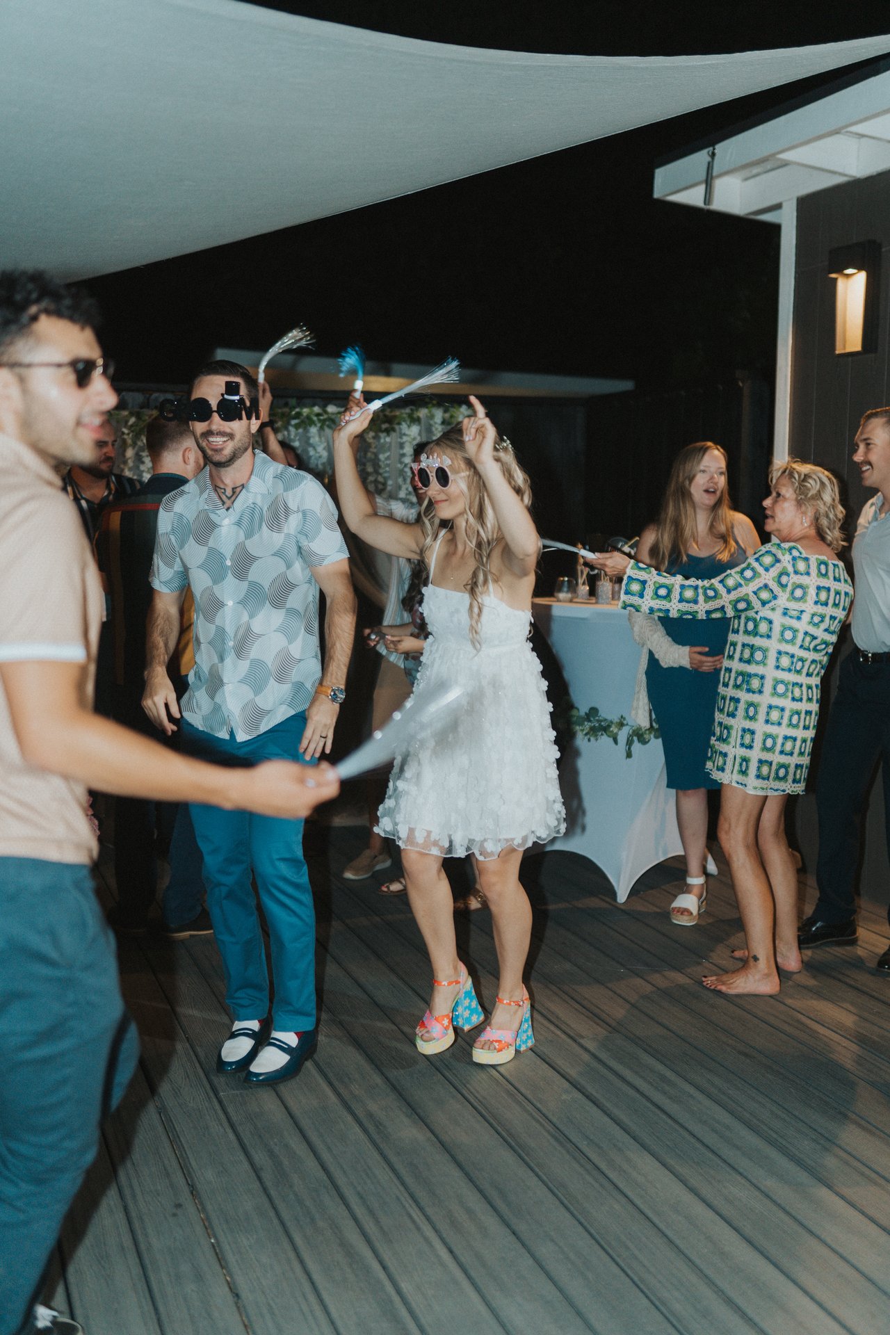 Lexy and Jeremy dancing with friends