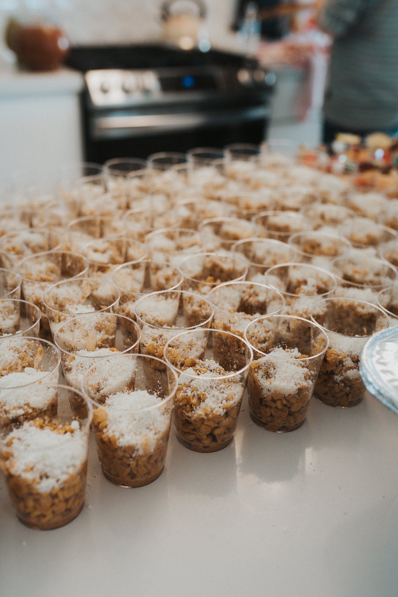 Rows of dessert cups ready for the guests