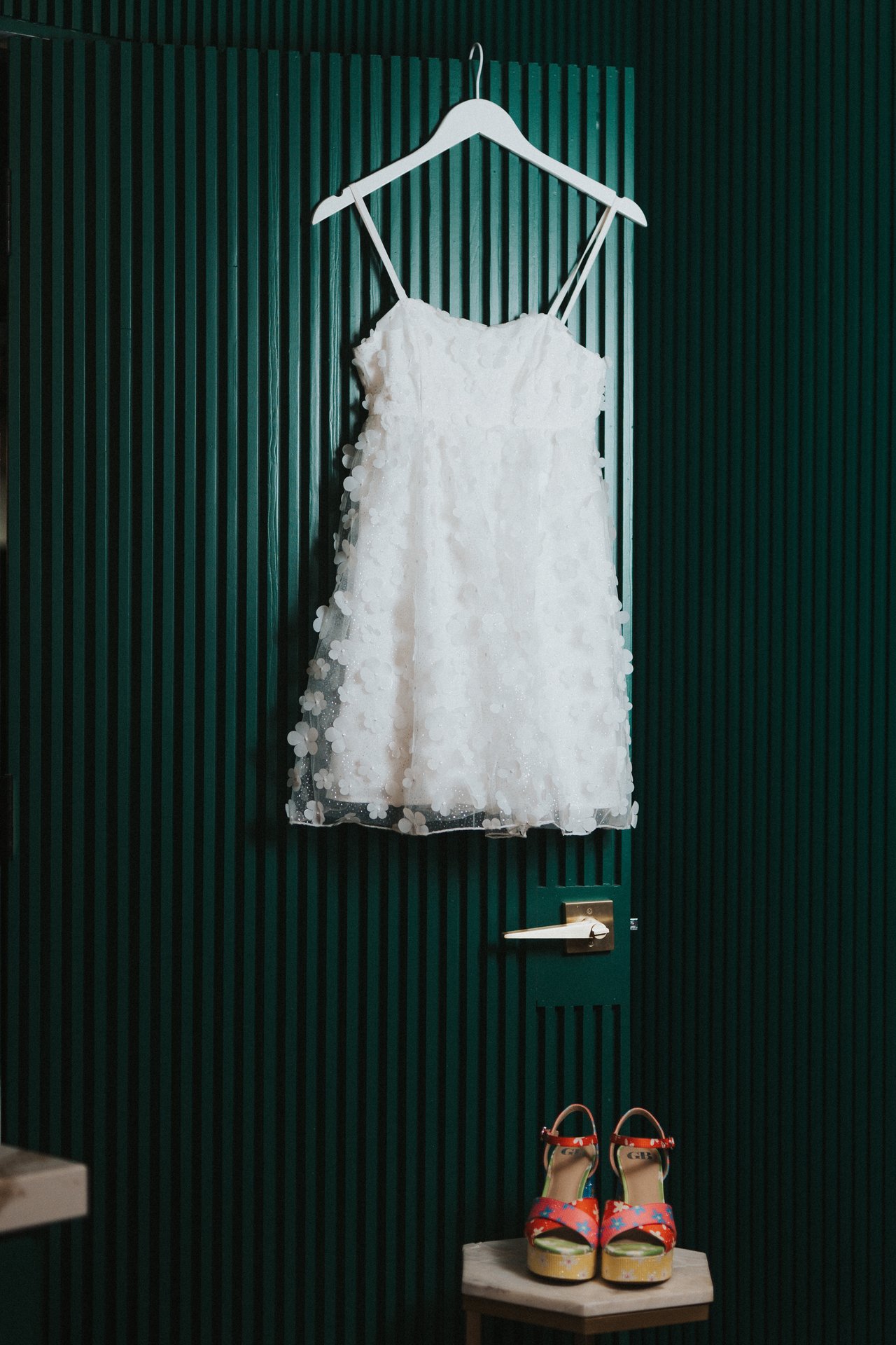 Lexy's wedding dress hanging before the ceremony