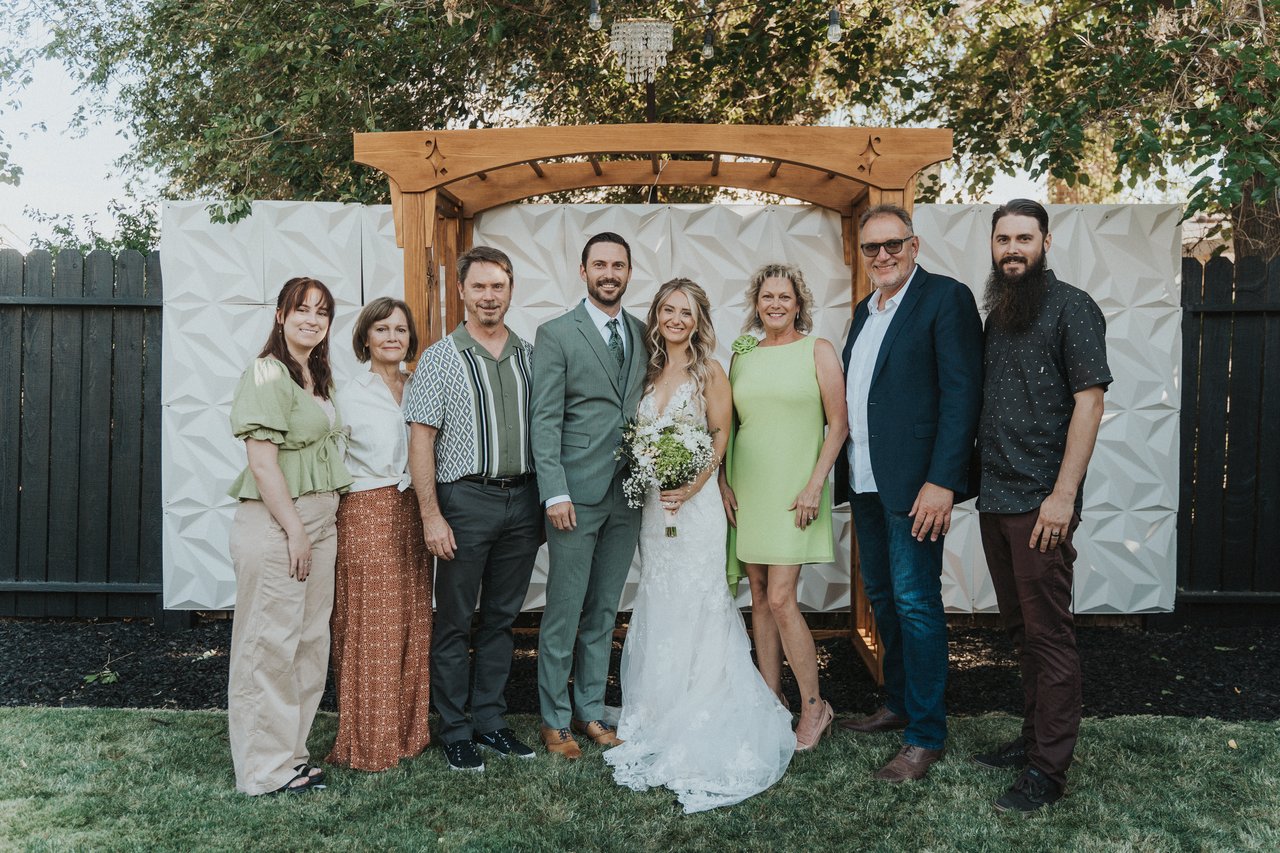 Lexy and Jeremy with family at the arbor