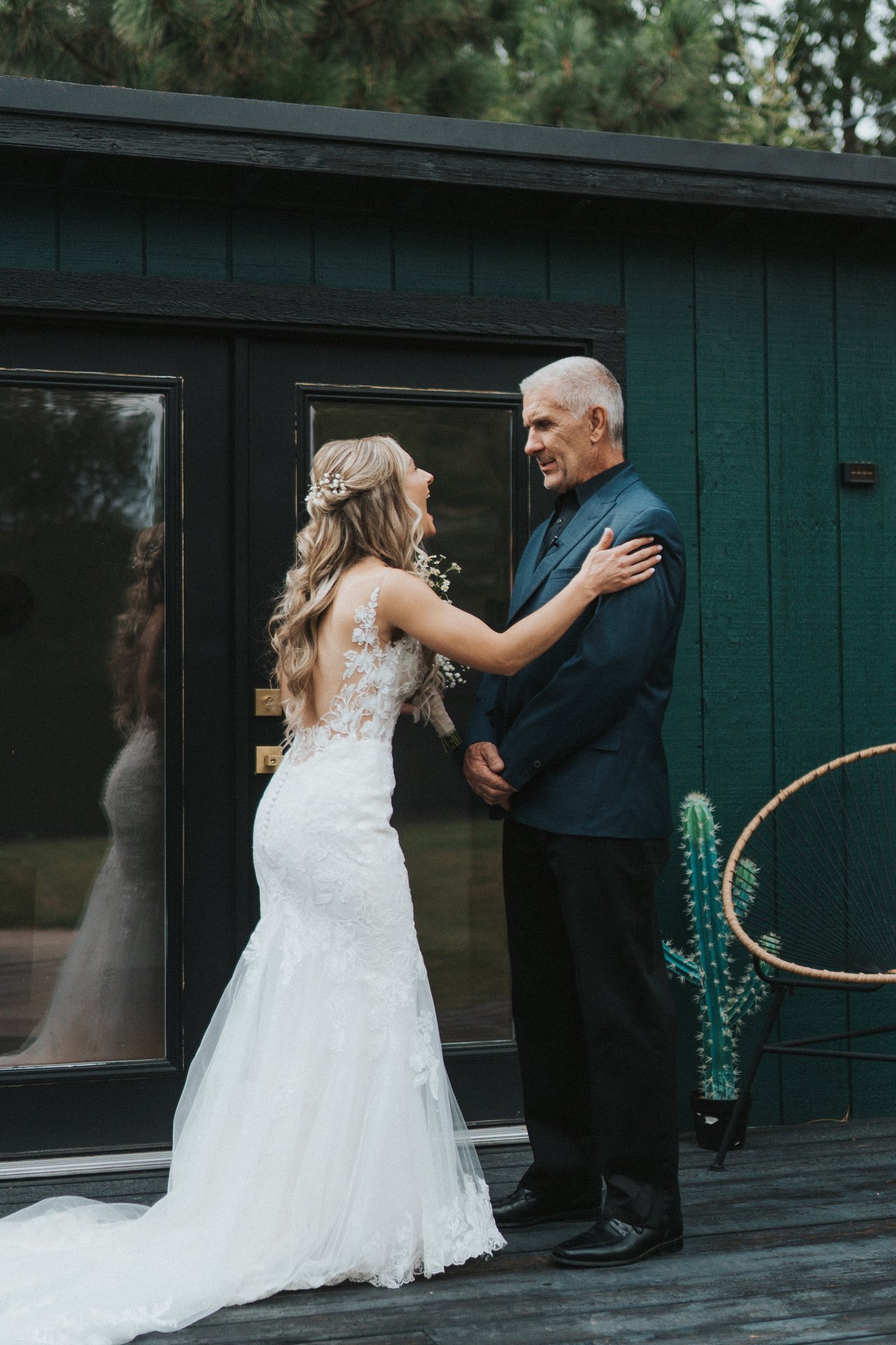 Lexy and her dad talking on the deck