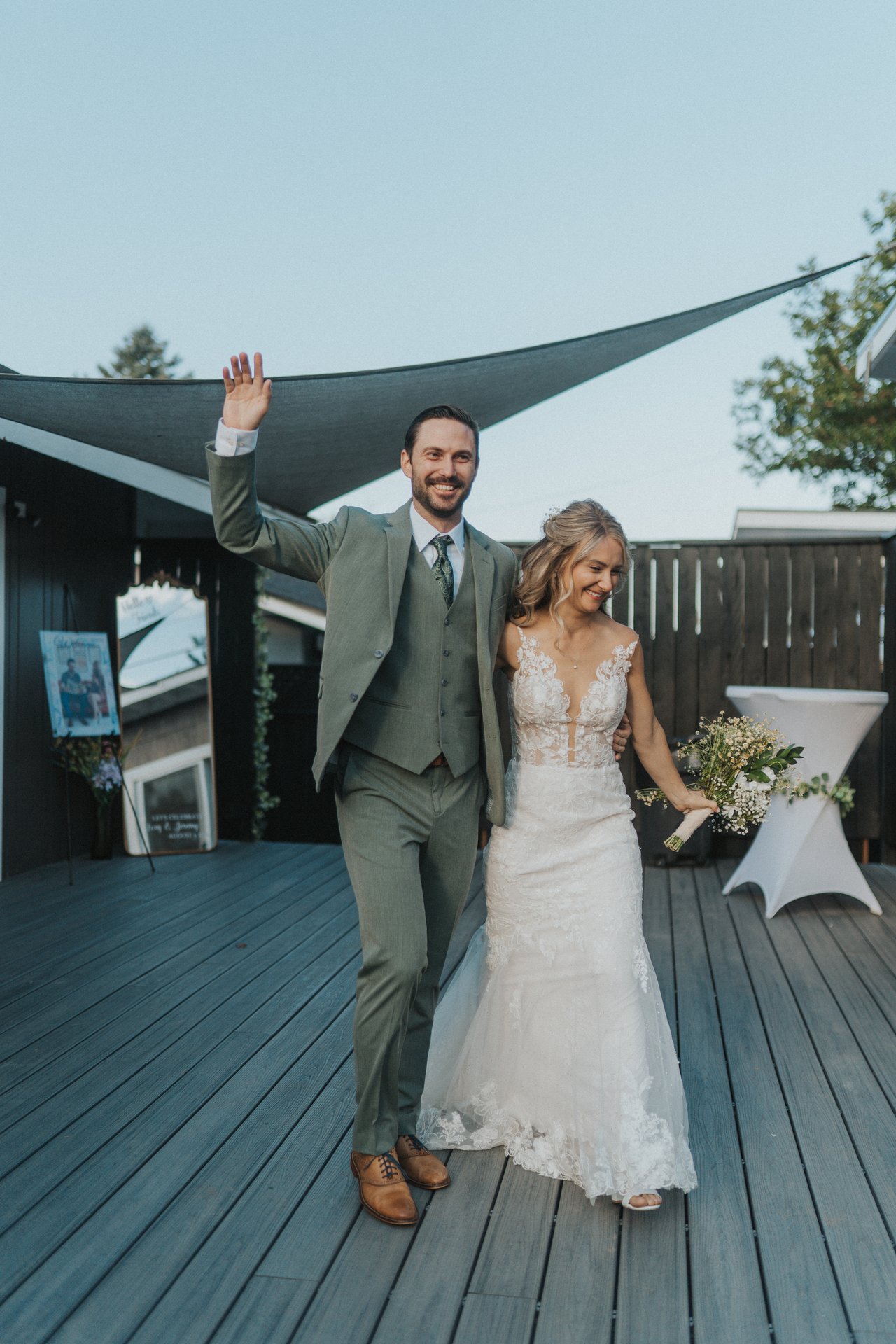 Jeremy waves as he and Lexy enter