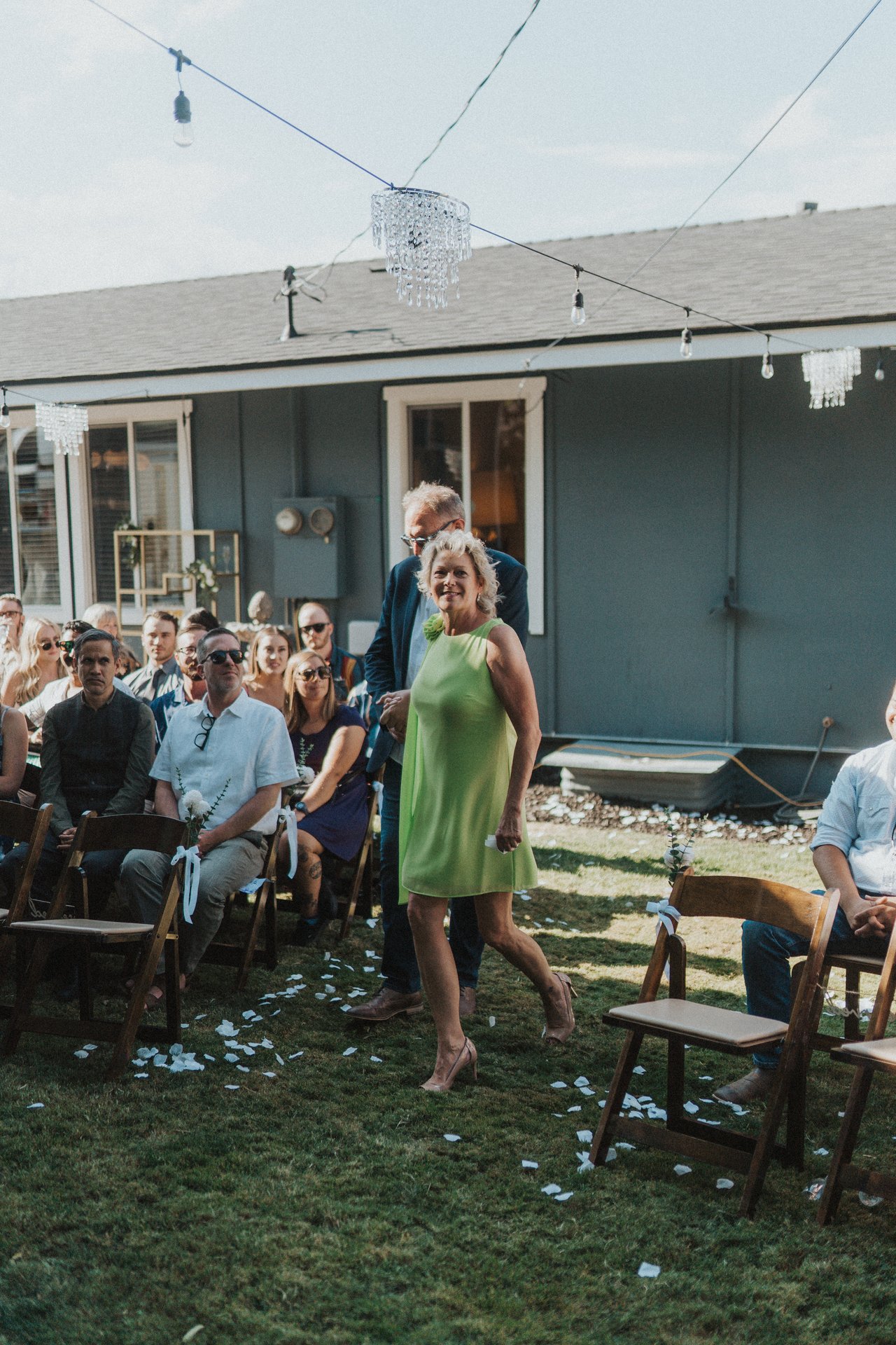 Guests walk down the aisle before the ceremony