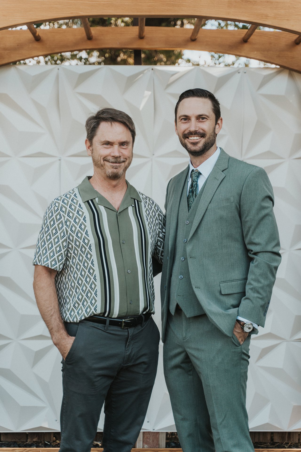 Jeremy with a guest in a striped shirt