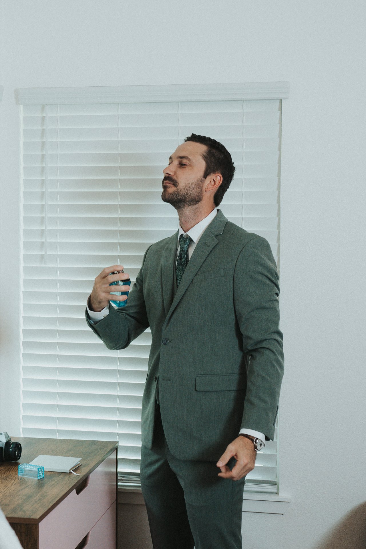 Jeremy dressed and ready by the window