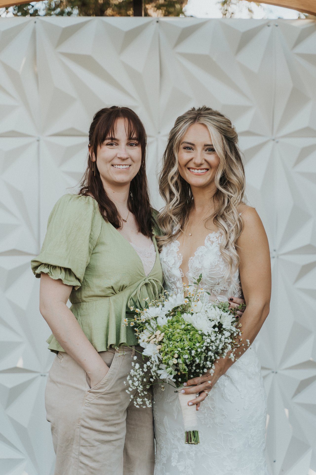 Lexy with a friend in a green blouse