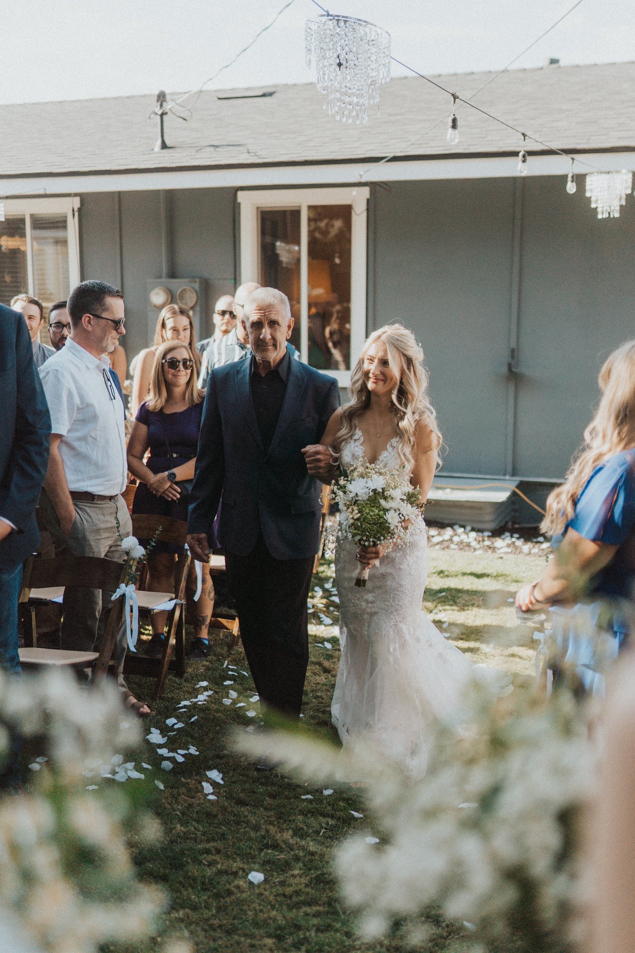 Lexy and her dad near the end of the aisle