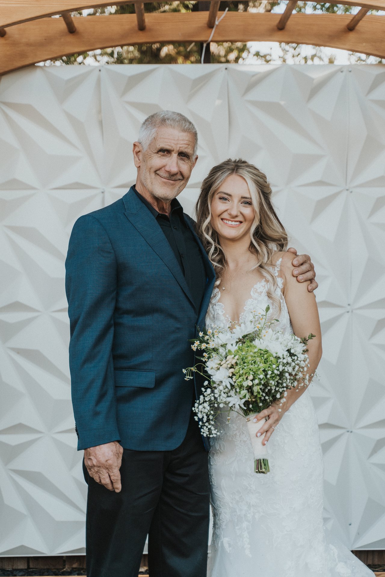 Lexy and her dad close up at the arbor