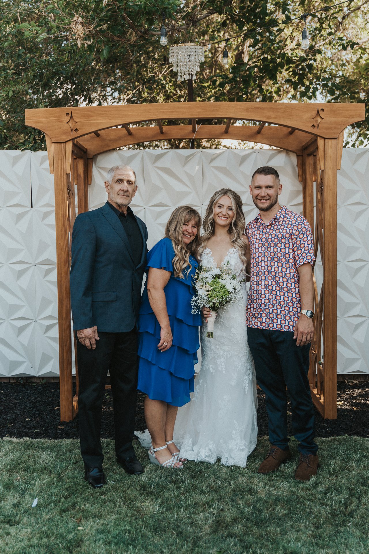 Lexy with her parents and a family member