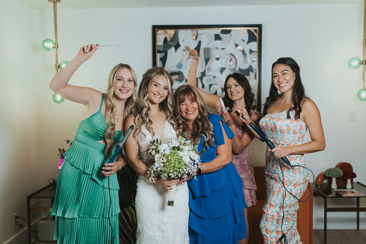 Lexy celebrating with her bridesmaids and mom
