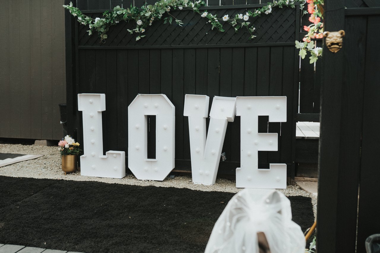 The LOVE letters set up on the backyard deck