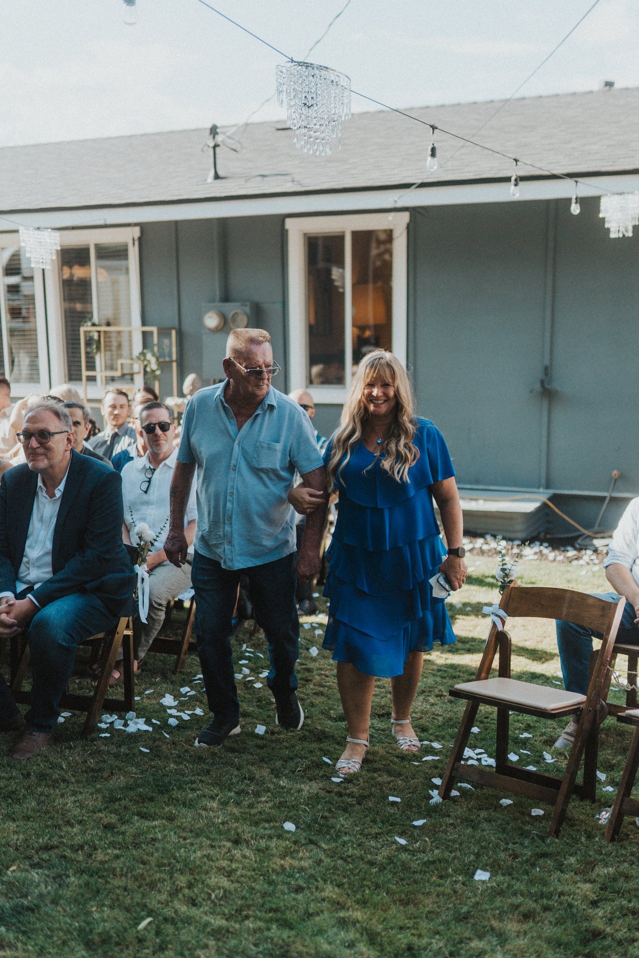 Lexy's mom walks down the aisle