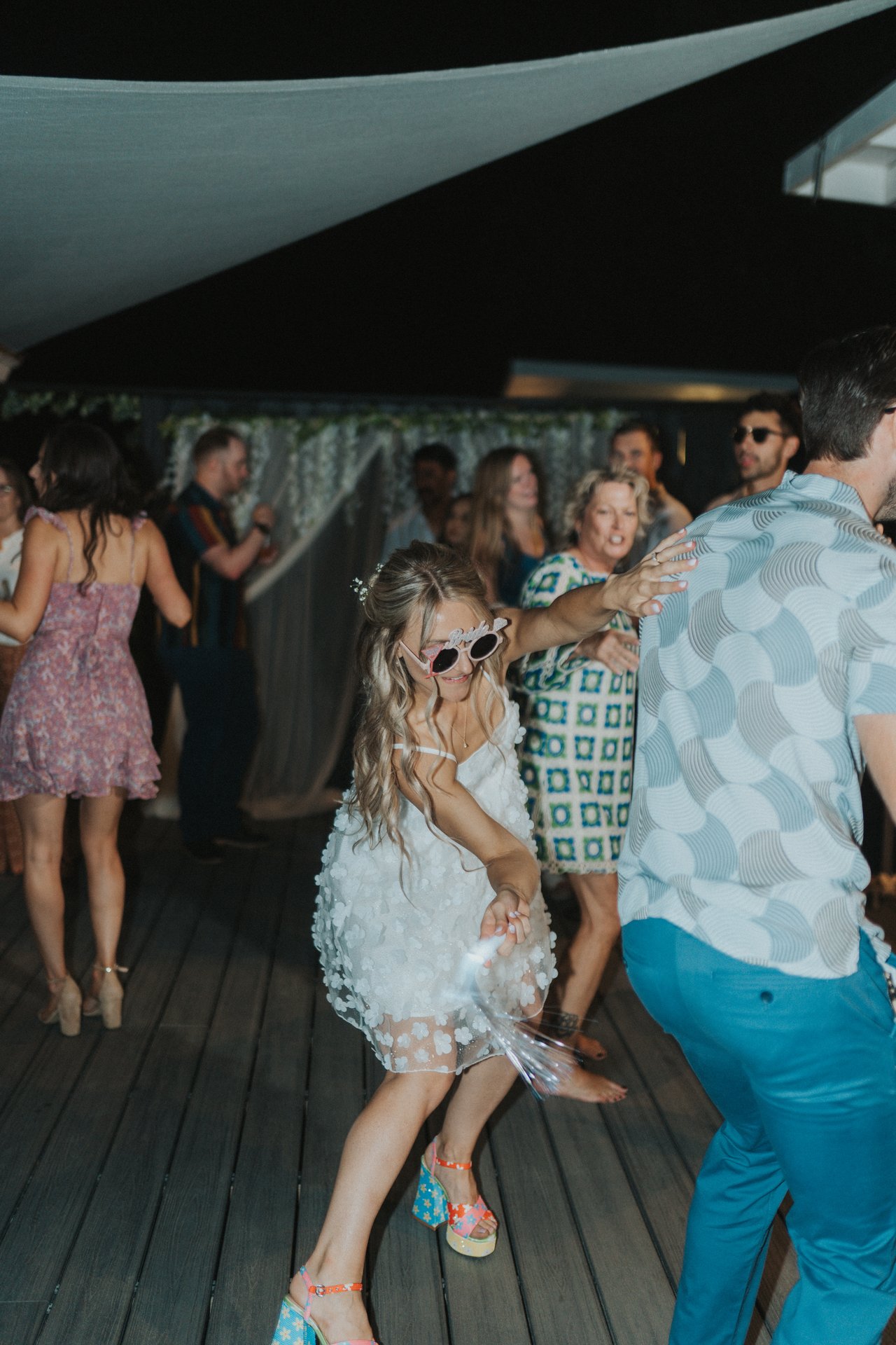 Novelty sunglasses on the dance floor