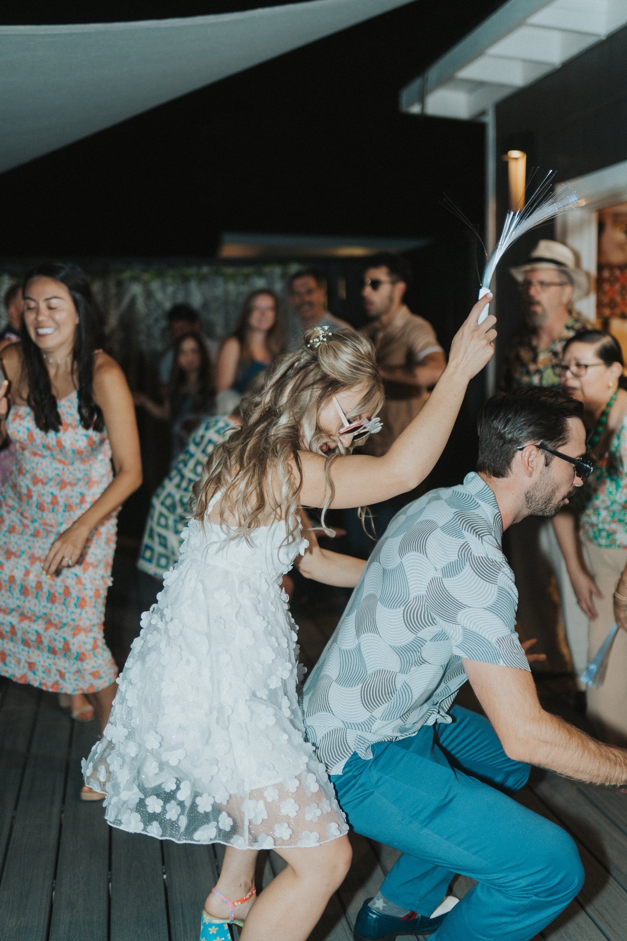 Lexy and Jeremy still dancing in novelty sunglasses