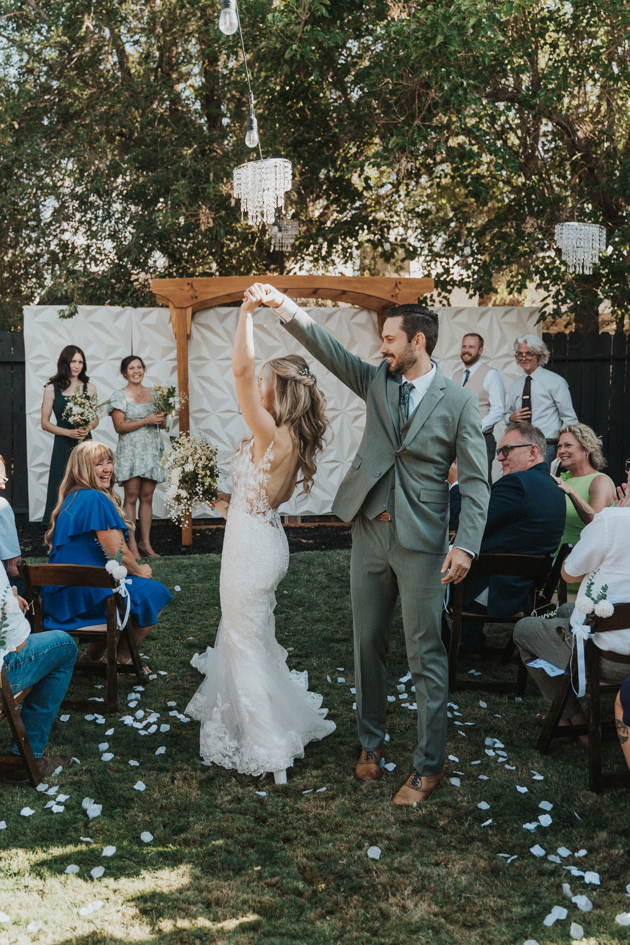 Jeremy twirls Lexy in the aisle