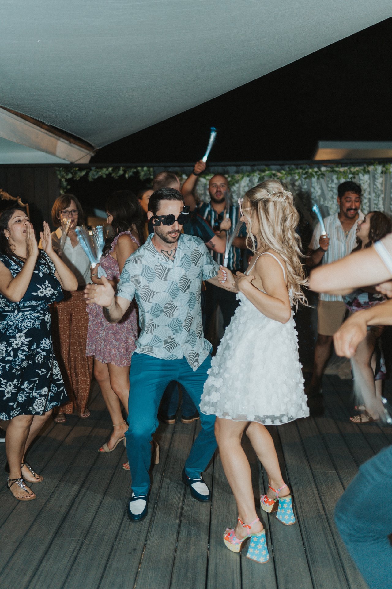 Lexy and Jeremy on the dance floor under the shade sail