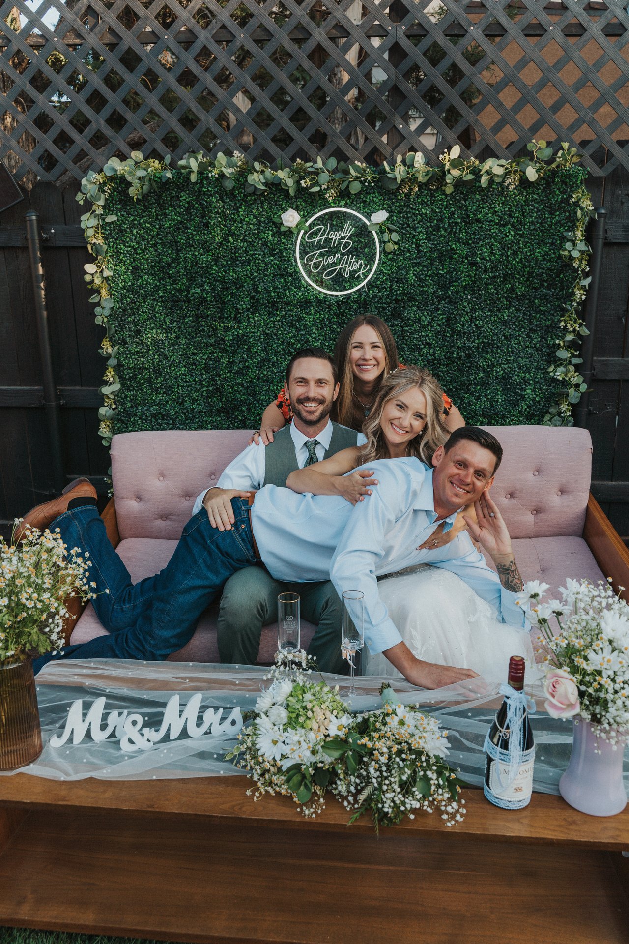 Friends pile onto the sweetheart couch with Lexy and Jeremy