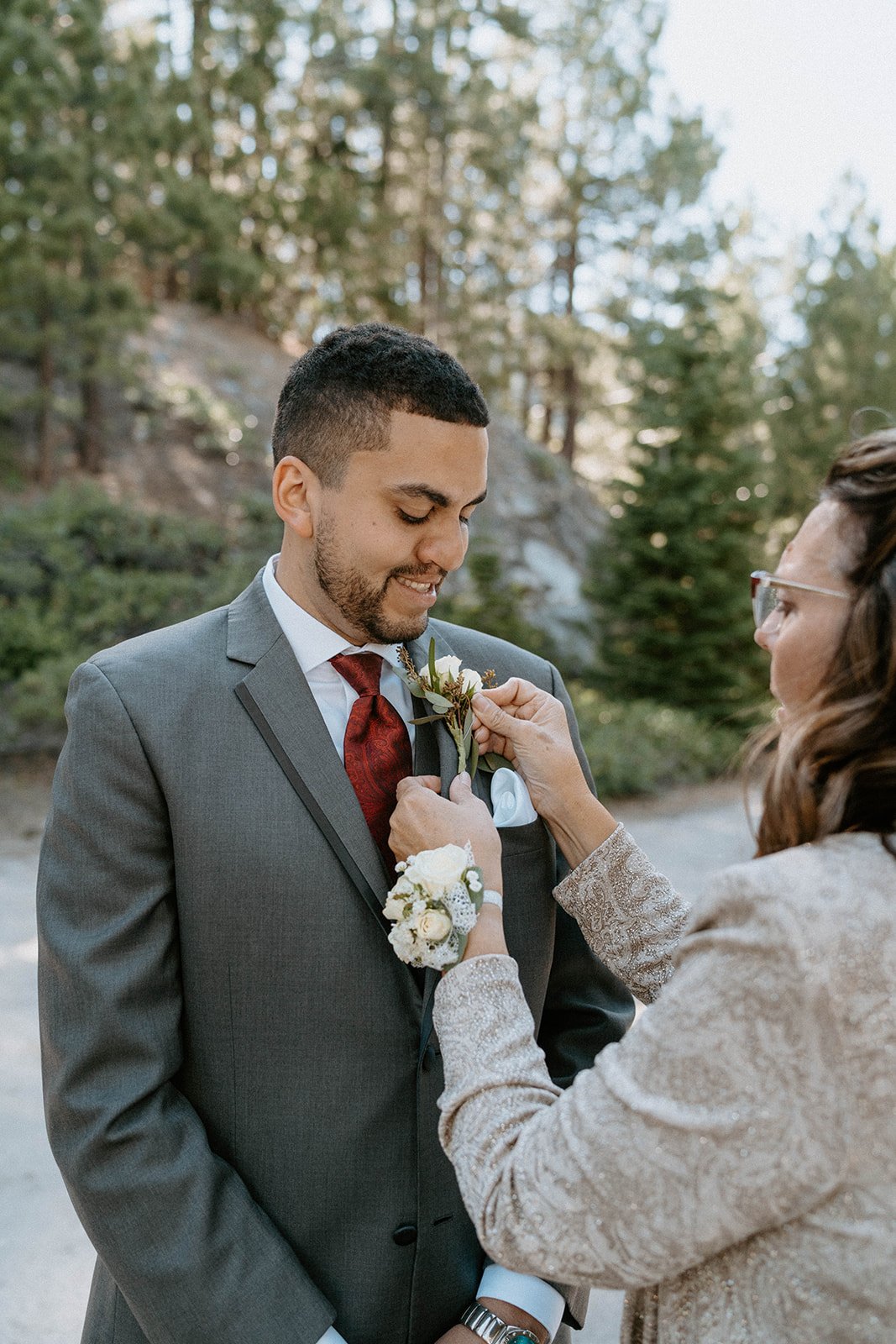 Jason gets his boutonniere pinned on