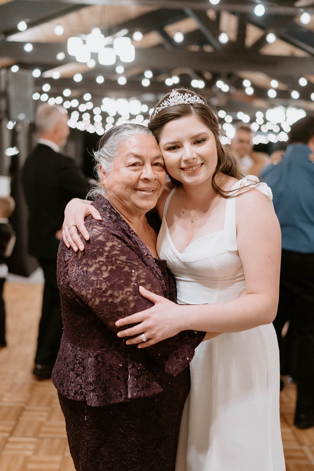Montse hugs a loved one on the dance floor